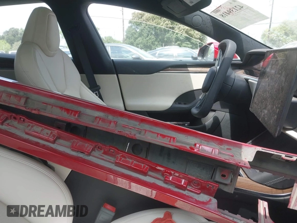 2022 Tesla Model S with VIN 5YJSA1E58NF486727, listed as a IAAI auction lot 42139418 with Not provided miles and . Bid and sale history available at DreamBid. Image 5.