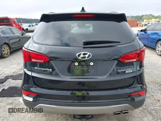 2018 Hyundai Santa Fe 2.0T z VIN 5NMZUDLA3JH057978, wystawiony jako IAAI lot #41930580 z przebiegiem 118 100 mil mil oraz . Historia ofert i sprzedaży dostępna na DreamBid. Obrazek 16.
