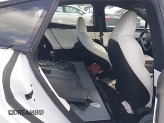 2021 Tesla Model S Long Range with VIN 5YJSA1E57MF428512, listed as a IAAI auction lot 42511020 with 29,611 mi miles and . Bid and sale history available at DreamBid. Image 8.