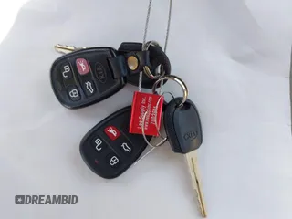 2005 Kia Spectra LX z VIN KNAFE122355118194, wystawiony jako IAAI lot #42454058 z przebiegiem 125 456 mil mil oraz . Historia ofert i sprzedaży dostępna na DreamBid. Obrazek 11.