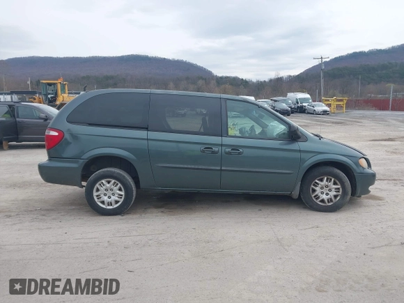 2003 Dodge Grand Caravan with VIN 2D4GP44313R240791, listed as a IAAI auction lot 41937009 with 231,913 mi miles and . Bid and sale history available at DreamBid. Image 12.