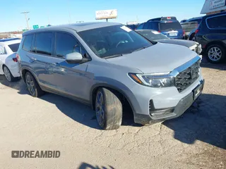 2022 Honda Passport EX-L with VIN 5FNYF7H57NB005716, listed as a IAAI auction lot 41078499 with 33,141 mi miles and . Bid and sale history available at carsss.com. Image 1.
