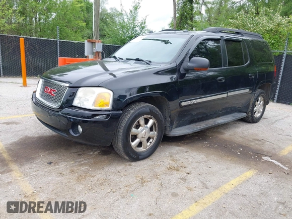 2005 GMC Envoy XL SLE with VIN 1GKET16S156114805, listed as a IAAI auction lot 42163519 with 168,584 mi miles. Bid and sale history available at carsss.com. Image 2.
