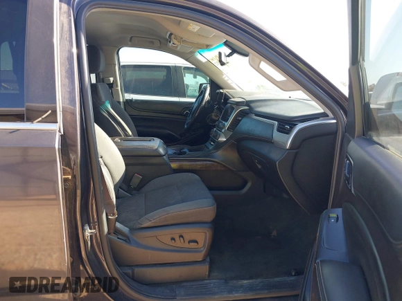 2015 Chevrolet Tahoe LS with VIN 1GNSCAKC9FR122896, listed as a IAAI auction lot 42239812 with 164,888 mi miles and . Bid and sale history available at DreamBid. Image 5.