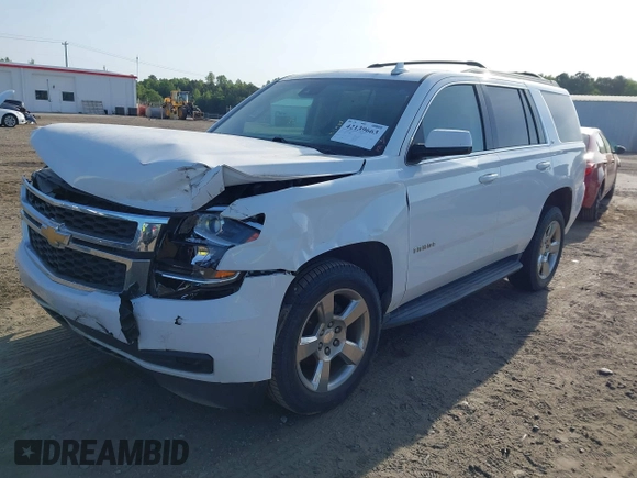 2016 Chevrolet Tahoe LT z VIN 1GNSCBKC9GR466543, wystawiony jako IAAI lot #42139663 z przebiegiem 235 744 mil mil oraz . Historia ofert i sprzedaży dostępna na DreamBid. Obrazek 17.