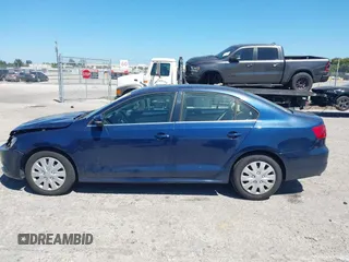 2013 Volkswagen Jetta SE z VIN 3VWDX7AJ0DM396590, wystawiony jako IAAI lot #41829922 z przebiegiem 133 356 mil mil oraz . Historia ofert i sprzedaży dostępna na DreamBid. Obrazek 14.