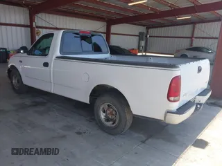 1999 Ford F-150 with VIN 1FTZF1721XKB63483, listed as a IAAI auction lot 42327278 with Not provided miles and . Bid and sale history available at DreamBid. Image 3.