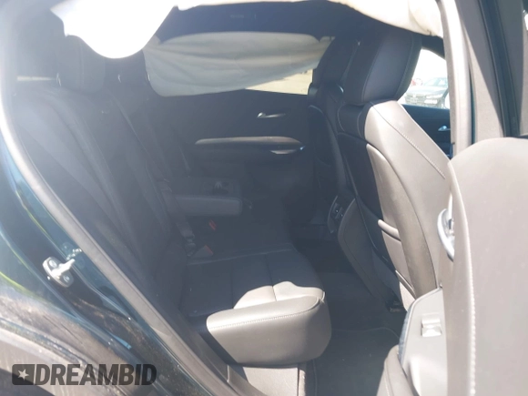 2025 Cadillac XT4 FWD Premium Luxury z VIN 1GYFZCR47SF146106, wystawiony jako IAAI lot #42324320 z przebiegiem 4 601 mil mil oraz . Historia ofert i sprzedaży dostępna na DreamBid. Obrazek 8.