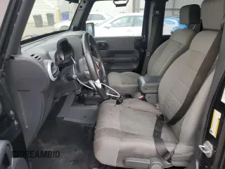 2008 Jeep Wrangler Unlimited Sahara with VIN 1J4GA59148L574934, listed as a Copart auction lot 74590164 with 134,674 mi miles and Salvage title. Bid and sale history available at DreamBid. Image 7.