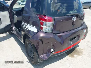 2012 Scion iQ with VIN JTNJJXB0XCJ021245, listed as a IAAI auction lot 42463167 with 158,901 mi miles and . Bid and sale history available at DreamBid. Image 6.