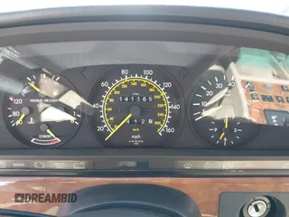 1989 Mercedes-Benz 560 with VIN WDBCA39D7KA436793, listed as a IAAI auction lot 42190980 with 141,165 mi miles and . Bid and sale history available at DreamBid. Image 7.