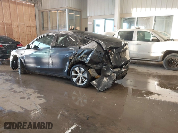 2023 Tesla Model Y Long Range with VIN 7SAYGDEE5PA033341, listed as a IAAI auction lot 41379625 with Not provided miles and . Bid and sale history available at DreamBid. Image 6.