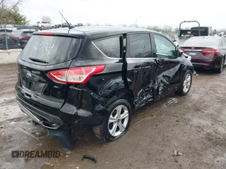 2016 Ford Escape SE with VIN 1FMCU0G78GUB56029, listed as a IAAI auction lot 41904627 with 102,685 mi miles. Bid and sale history available at carsss.com. Image 4.
