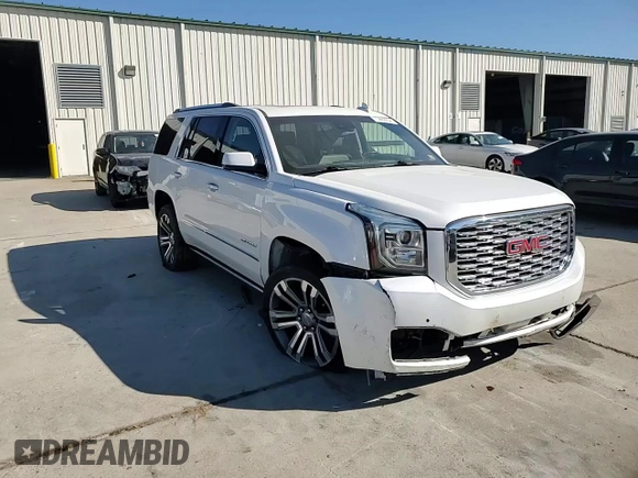2019 GMC Yukon Denali with VIN 1GKS2CKJ1KR310963, listed as a Copart auction lot 75862254 with 102,602 mi miles and Salvage Title. Bid and sale history available at carsss.com. Image 12.