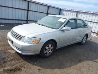 2003 Toyota Avalon XL with VIN 4T1BF28B43U305633, listed as a IAAI auction lot 42033322 with 246,802 mi miles. Bid and sale history available at carsss.com. Image 2.