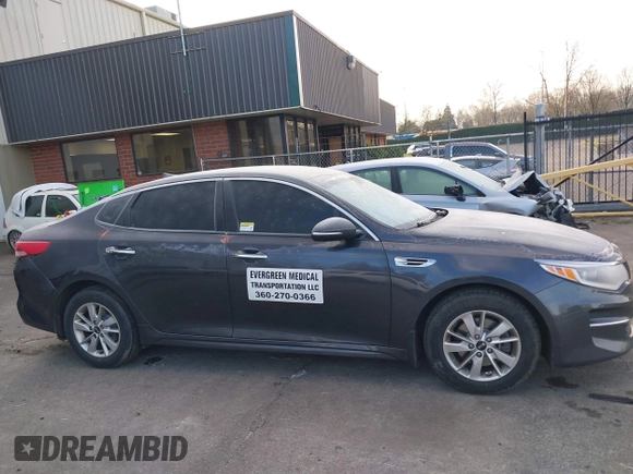 2017 Kia Optima LX with VIN 5XXGT4L32HG156845, listed as a IAAI auction lot 41402224 with 126,529 mi miles. Bid and sale history available at carsss.com. Image 13.