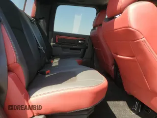 2016 Ram 1500 Rebel z VIN 1C6RR7YT1GS350439, wystawiony jako Copart lot #52300885 z przebiegiem 196 557 mil mil oraz Szkody całkowita. Historia ofert i sprzedaży dostępna na DreamBid. Obrazek 10.