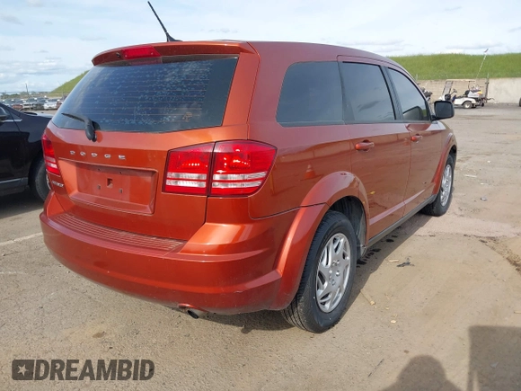 2014 Dodge Journey SE with VIN 3C4PDCAB8ET136794, listed as a IAAI auction lot 41986986 with 142,080 mi miles and . Bid and sale history available at DreamBid. Image 4.