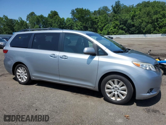 2015 Toyota Sienna Limited with VIN 5TDDK3DC4FS111836, listed as a Copart auction lot 61940595 with 111,579 mi miles and Salvage title. Bid and sale history available at DreamBid. Image 4.