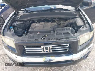 2006 Honda Ridgeline RTL with VIN 2HJYK165X6H558475, listed as a IAAI auction lot 42555097 with 180,711 mi miles and . Bid and sale history available at DreamBid. Image 10.