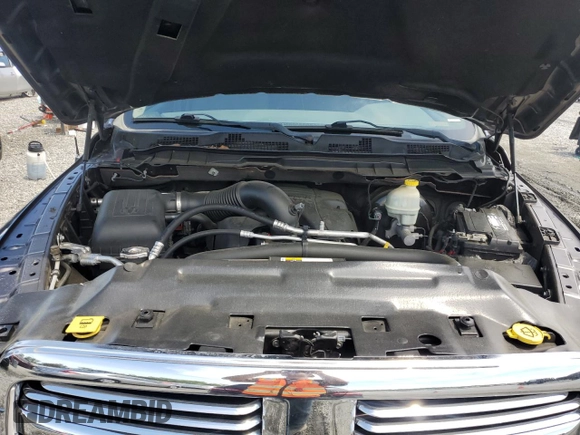 2015 Ram 1500 Lone Star z VIN 1C6RR6LT5FS735468, wystawiony jako Copart lot #54254855 z przebiegiem 196 792 mil mil oraz Szkoda całkowita • Salvage title. Historia ofert i sprzedaży dostępna na DreamBid. Obrazek 11.