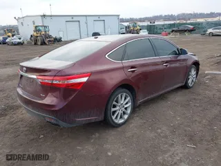 2013 Toyota Avalon XLE with VIN 4T1BK1EB4DU029014, listed as a IAAI auction lot 41689404 with 130,297 mi miles. Bid and sale history available at carsss.com. Image 4.