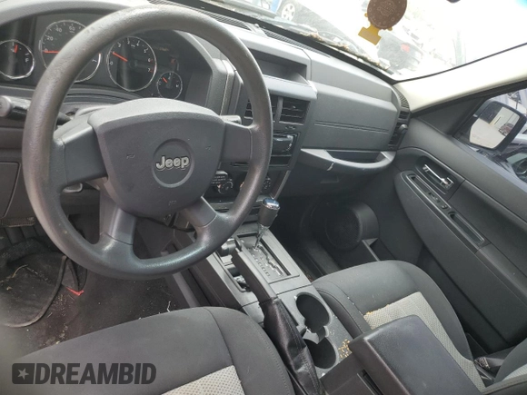 2010 Jeep Liberty Sport with VIN 1J4PN2GK2AW144063, listed as a Copart auction lot 58055585 with 132,580 mi miles and Salvage title. Bid and sale history available at DreamBid. Image 8.