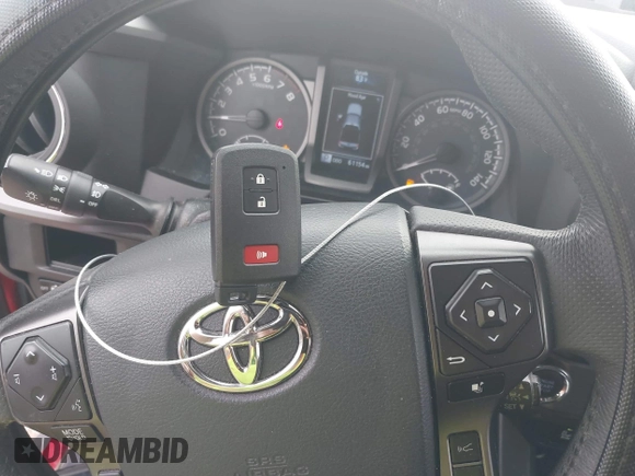 2018 Toyota Tacoma SR5 with VIN 5TFAZ5CN0JX063350, listed as a IAAI auction lot 41829396 with 61,155 mi miles and . Bid and sale history available at DreamBid. Image 11.