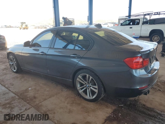 2012 BMW 3 Series 328i with VIN WBA3A5C5XCF340494, listed as a Copart auction lot 61669965 with 70,838 mi miles and Salvage title. Bid and sale history available at DreamBid. Image 2.