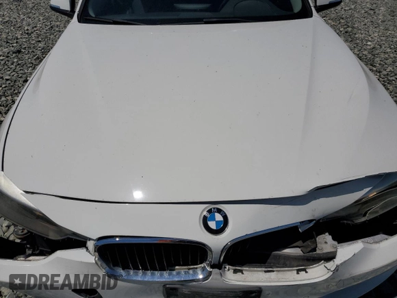 2014 BMW 3 Series 320i with VIN WBA3B1C55EK133687, listed as a Copart auction lot 63049945 with 95,604 mi miles and Salvage title. Bid and sale history available at DreamBid. Image 11.