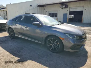2019 Honda Civic Sport with VIN 2HGFC2F80KH565567, listed as a Copart auction lot 52384625 with 89,947 mi miles and Salvage title. Bid and sale history available at DreamBid. Image 4.