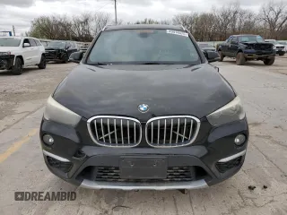 2017 BMW X1 xDrive28i with VIN WBXHT3C35H5F68752, listed as a Copart auction lot 49414675 with 114,308 mi miles and Clean Title. Bid and sale history available at carsss.com. Image 5.