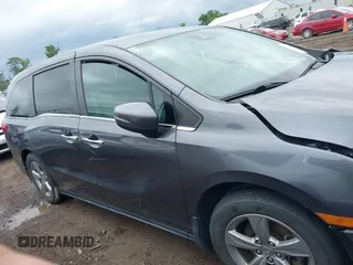 2018 Honda Odyssey EX-L z VIN 5FNRL6H74JB043276, wystawiony jako IAAI lot #42326742 z przebiegiem 126 025 mil mil oraz . Historia ofert i sprzedaży dostępna na DreamBid. Obrazek 13.