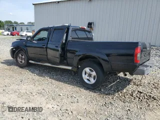 2002 Nissan Frontier XE with VIN 1N6ED29X62C332917, listed as a Copart auction lot 57506815 with 268,771 mi miles and Salvage title. Bid and sale history available at DreamBid. Image 2.