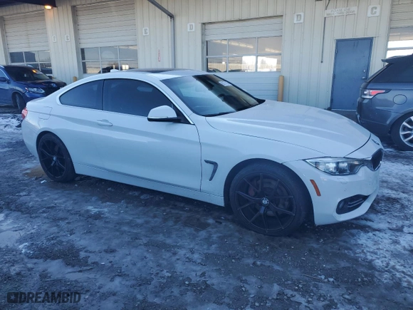 2014 BMW 4 Series 435i xDrive with VIN WBA3R5C53EK186567, listed as a Copart auction lot 88777915 with 96,656 mi miles and Salvage Title. Bid and sale history available at carsss.com. Image 4.