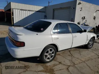 1992 Toyota Camry LE z VIN 4T1SK12E8NU044387, wystawiony jako Copart lot #43195915 z przebiegiem 279 199 mil mil oraz Szkoda całkowita • Salvage title. Historia ofert i sprzedaży dostępna na DreamBid. Obrazek 3.