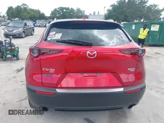 2023 Mazda CX-30 Premium с VIN 3MVDMBDY3PM507398, выставлен на аукционе IAAI как лот 42533176 с пробегом 15 788 миль миль и . История ставок и продаж доступна на DreamBid. Изображение 16.