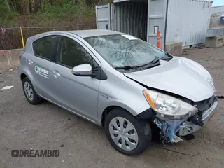 2012 Toyota Prius One z VIN JTDKDTB32C1026748, wystawiony jako IAAI lot #42133901 z przebiegiem 190 480 mil mil oraz . Historia ofert i sprzedaży dostępna na DreamBid. Obrazek 1.