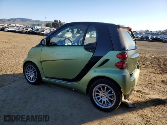2012 Smart fortwo Pure z VIN WMEEJ3BA7CK543415, wystawiony jako Copart lot #42707385 z przebiegiem 76 280 mil mil oraz Szkody całkowita. Historia ofert i sprzedaży dostępna na DreamBid. Obrazek 2.