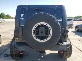 2016 Jeep Wrangler Unlimited Rubicon with VIN 1C4HJWFG3GL155092, listed as a Copart auction lot 62410365 with 82,231 mi miles and Salvage title. Bid and sale history available at DreamBid. Image 6.