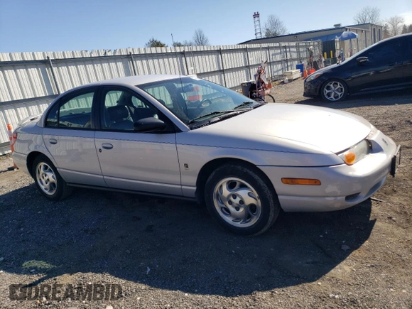 2001 Saturn SL z VIN 1G8ZK54701Z301199, wystawiony jako Copart lot #48488335 z przebiegiem 96 151 mil mil oraz Szkoda całkowita • Salvage title. Historia ofert i sprzedaży dostępna na DreamBid. Obrazek 4.