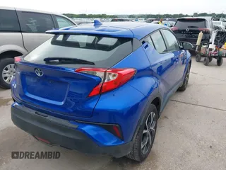 2018 Toyota C-HR XLE z VIN NMTKHMBX3JR043005, wystawiony jako IAAI lot #42419692 z przebiegiem 105 532 mil mil oraz . Historia ofert i sprzedaży dostępna na DreamBid. Obrazek 4.