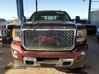 2015 GMC Sierra 2500HD Denali z VIN 1GT120E83FF114643, wystawiony jako Copart lot #57632835 z przebiegiem 166 561 mil mil oraz Szkoda całkowita • Salvage title. Historia ofert i sprzedaży dostępna na DreamBid. Obrazek 5.