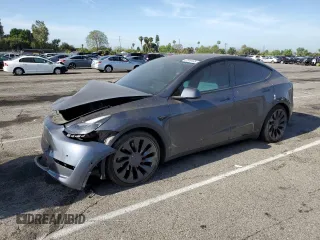 2022 Tesla Model Y Performance z VIN 7SAYGDEF1NF405329, wystawiony jako Copart lot #57249195 z przebiegiem 62 423 mil mil oraz Szkoda całkowita • Salvage title. Historia ofert i sprzedaży dostępna na DreamBid. Obrazek 1.