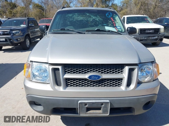 2005 Ford Explorer Sport Trac XLS z VIN 1FMZU67K75UA18027, wystawiony jako IAAI lot #41694106 z przebiegiem 144 900 mil mil oraz . Historia ofert i sprzedaży dostępna na DreamBid. Obrazek 6.