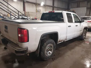 2016 GMC Sierra 1500 with VIN 1GTV2LEC0GZ309946, listed as a IAAI auction lot 41301986 with 99,286 mi miles and . Bid and sale history available at carsss.com. Image 4.