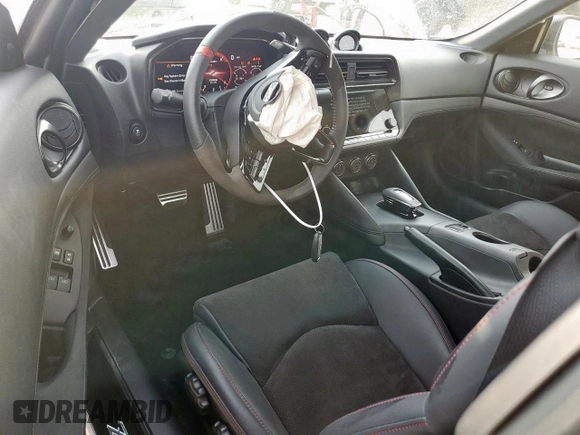 2024 Nissan Z Nismo с VIN JN1BZ4CH9RM360562, выставлен на аукционе Copart как лот 59863775 с пробегом 8 868 миль миль и Списание • Salvage title. История ставок и продаж доступна на DreamBid. Изображение 8.