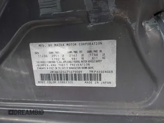 2007 Mazda 3 S Touring with VIN JM1BK323471679089, listed as a IAAI auction lot 42113600 with Not Provided miles and . Bid and sale history available at DreamBid. Image 9.