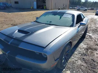 2016 Dodge Challenger SRT 392 with VIN 2C3CDZDJ5GH165903, listed as a IAAI auction lot 41281438 with 7,516 mi miles. Bid and sale history available at carsss.com. Image 2.