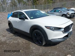 2022 Mazda CX-30 2.5 Turbo with VIN 3MVDMBAY7NM443187, listed as a IAAI auction lot 41771395 with 39,475 mi miles and . Bid and sale history available at carsss.com. Image 1.